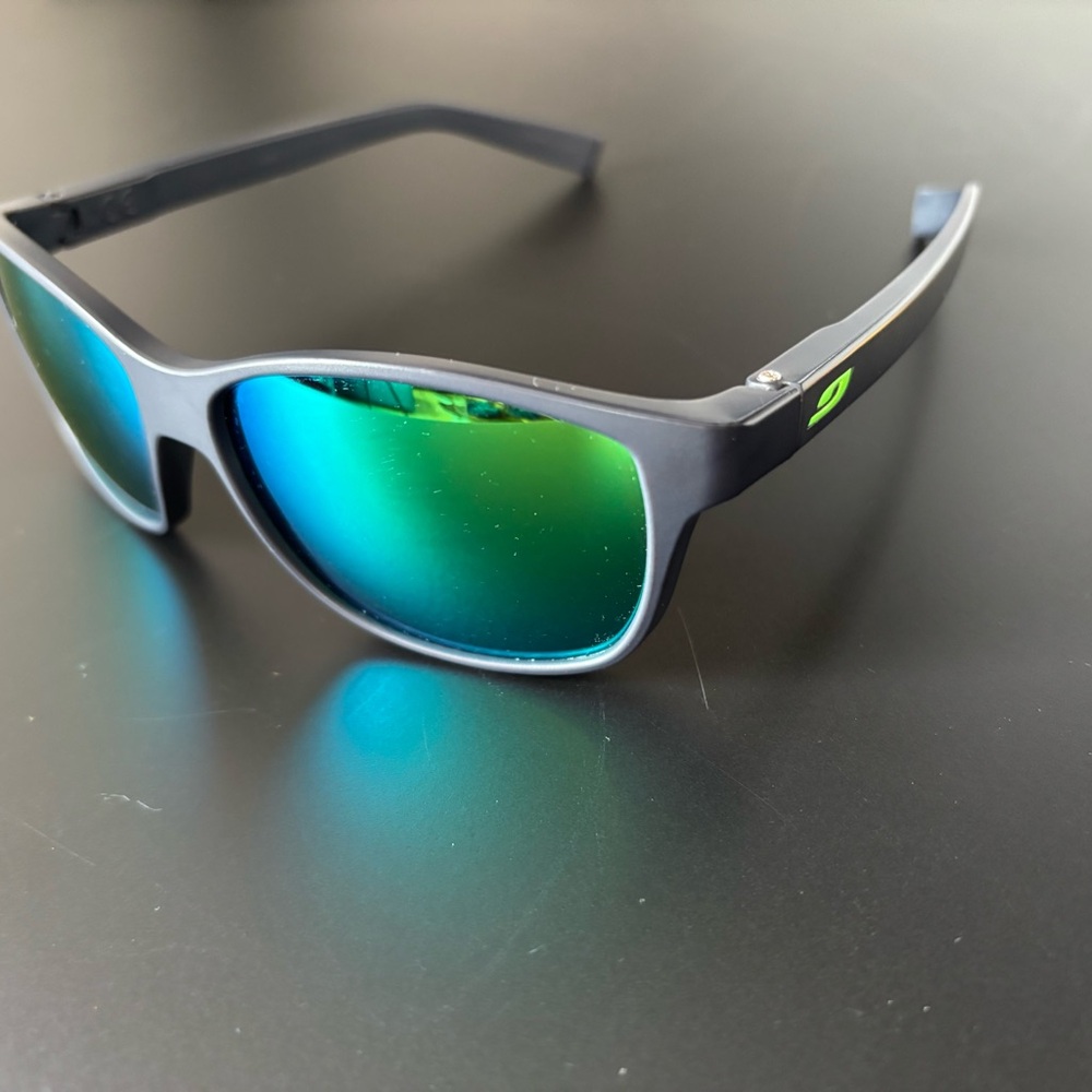 Stylish Black Sunglasses with Green Lenses